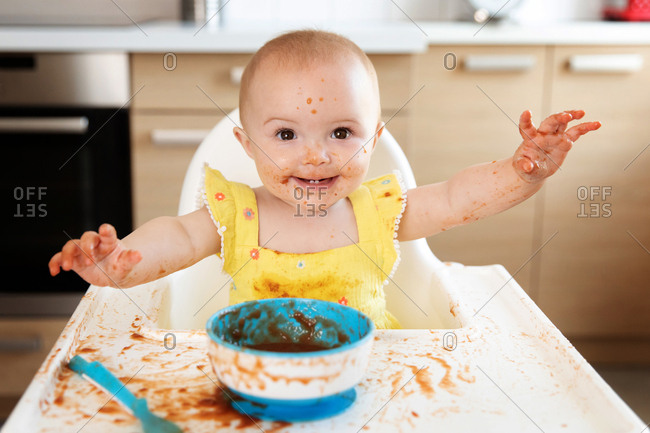 Baby eating shop in high chair