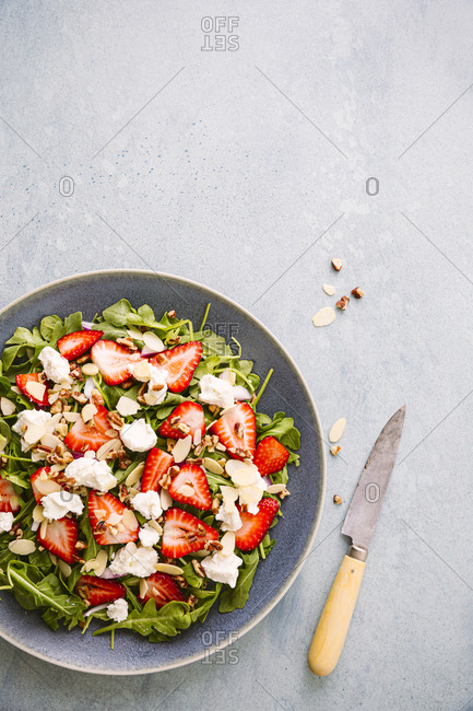 Plate of strawberry arugula salad