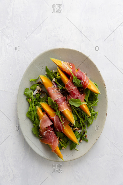 Platter of prosciutto wrapped melon