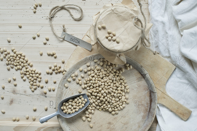 Soy beans on wooden background