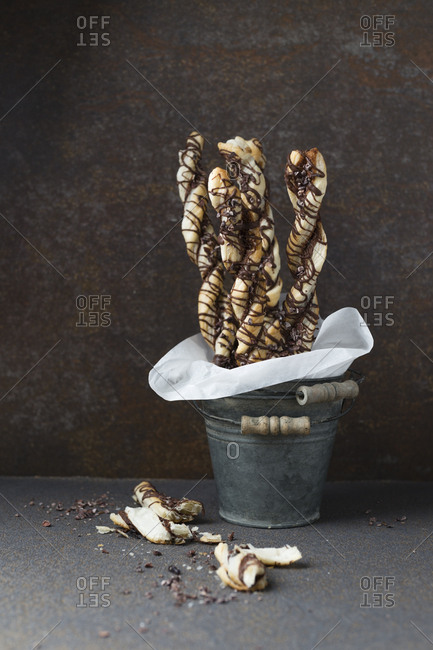 Puff paste sticks with cocoa and cocoa nibs