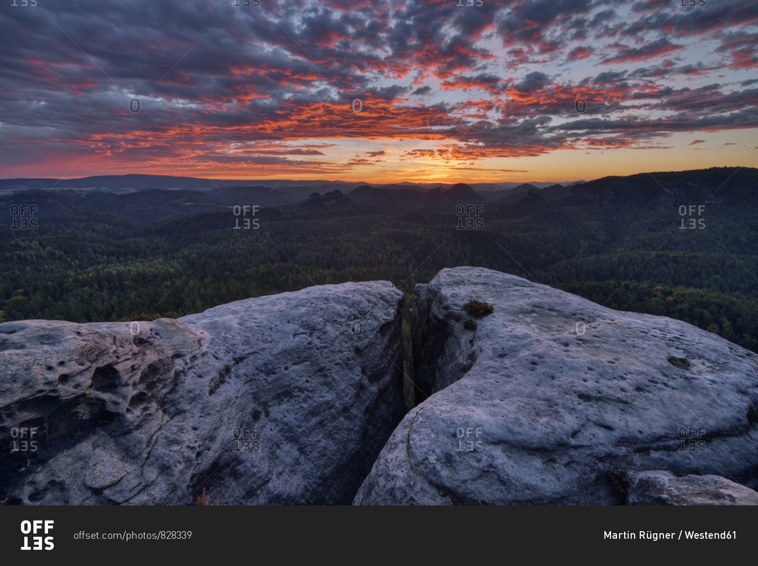 Germany- Saxony- Elbe Sandstone Mountains- view to the mountain Winterstein from the Gleitmannshorn at sunrise