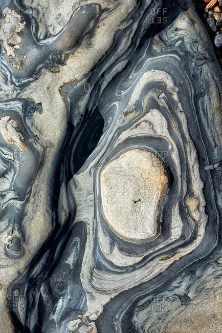 High angle view of tide pool rocks with unique colors and patterns