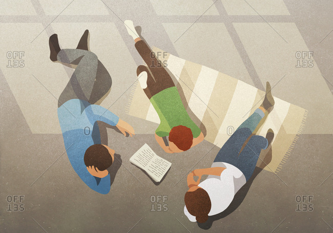 Family relaxing, reading book