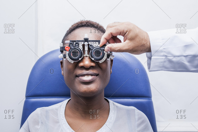 Studying a woman's eyesight - Offset