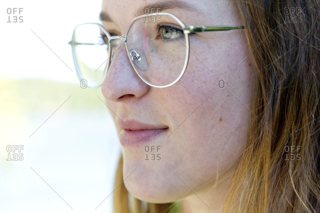 Portrait of young woman with glasses