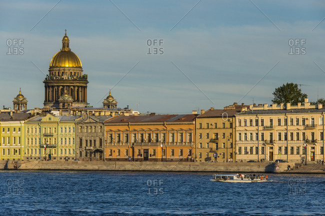 August 31, 2013: City center of St. Petersburg from the Neva at sunset with the St. Isaac cathedral- Russia