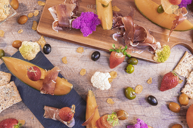 Arranged ingredients and snack with ham