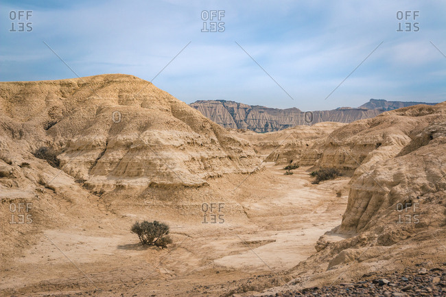 Amazing landscape of desert hills on background of blue sky