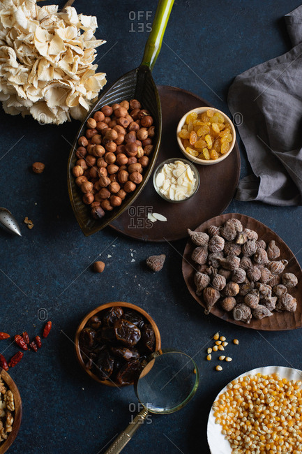 Various nuts and dried fruits: hazelnuts, walnuts, raisins from above
