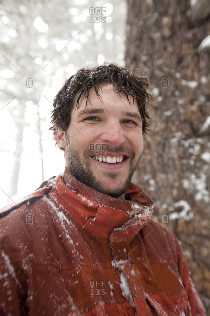 A portrait of a male telemark skier on a snowy day in Montana.