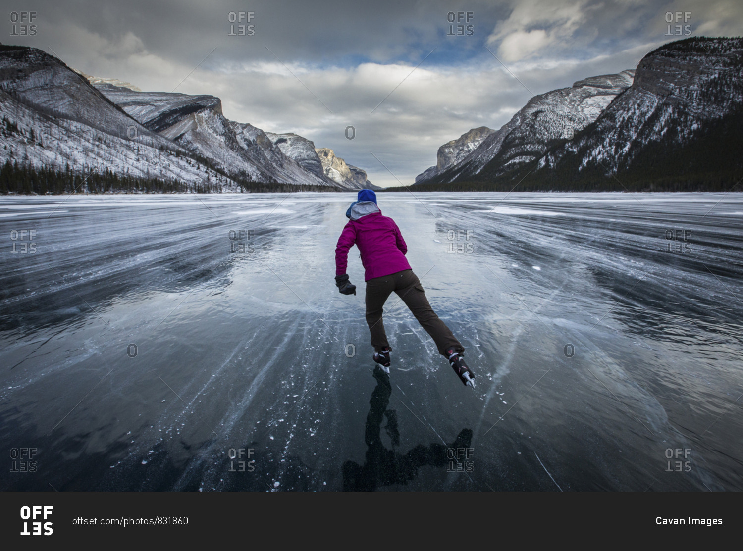 Ice skating at Lake Minnewanka, Banff National Park, Alberta, Canada