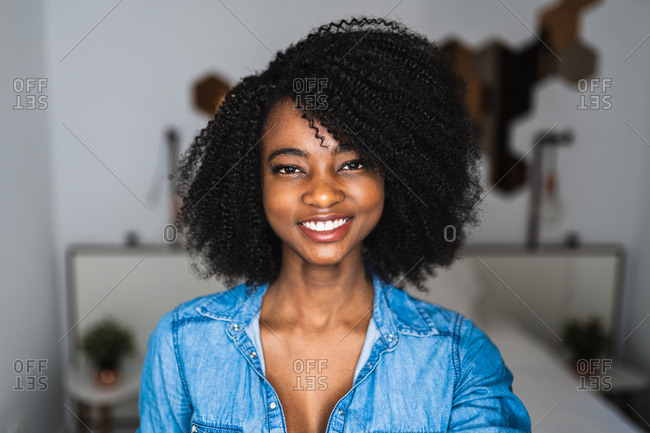 Closeup Beauty Portrait Of Young Brunette Woman With Lush Curly