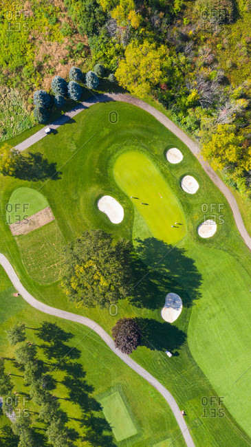 October 3, 2018: Aerial view of a golf course fairway and sand traps in autumn creating an abstract looking perspective at Arrowhead Golf Course in Wheaton, ILUSA