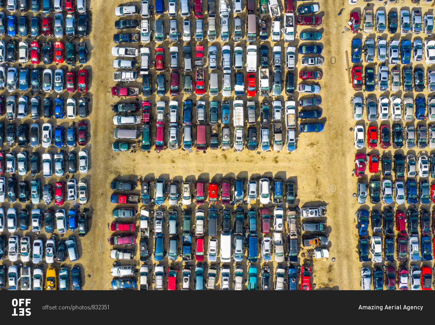 Aerial view of rows of old cars that have served, assembled in a junk yard waiting to be recycled for their reusable parts, Aurora, IL, USA.