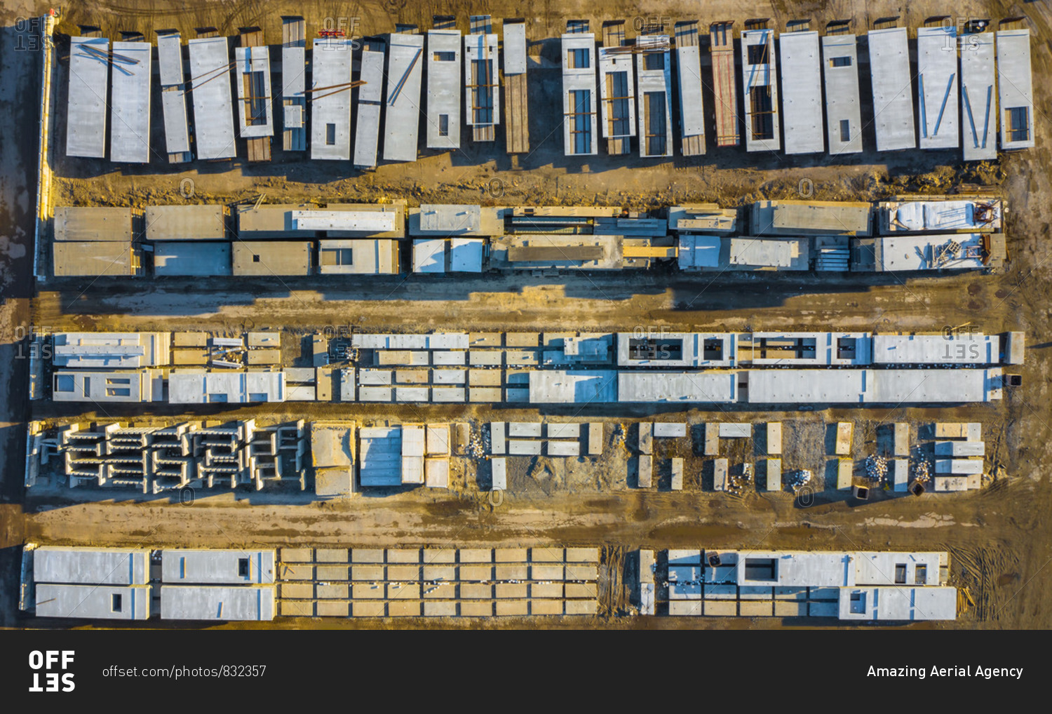 Aerial view of finished concrete slabs and related products at a concrete manufacturing facility in the afternoon sun in Aurora, IL, USA