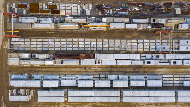 Aerial view of finished concrete slabs and related products at a concrete manufacturing facility in the afternoon sun in Aurora, IL, USA