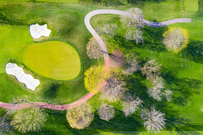 April 21, 2019: Aerial view of a golf course fairway and sand traps in early spring creating an abstract looking perspective at the Naperville Country Club in Napervile, ILUSA