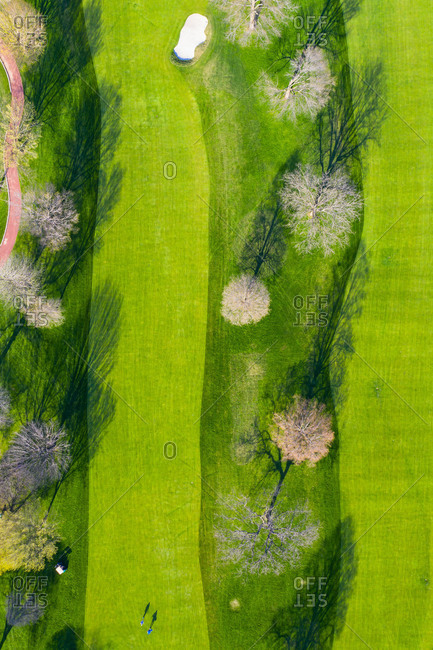 April 21, 2019: Aerial view of a golf course fairway and sand traps in early spring creating an abstract looking perspective at the Naperville Country Club in Napervile, ILUSA