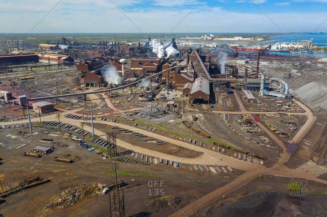 BURNS HARBOR, INDIANA, USAMAY 14, 2019: Aerial view of a modern steel producing facility on the shores of Lake Michigan in Indiana, USA