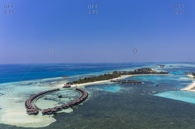 Aerial view over Olhuveli with water bungalows- South Male Atoll- Maldives