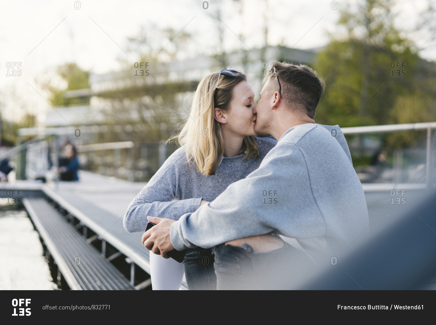 Young couple kissing on jetty at Lake Zurich- Zurich- Switzerland