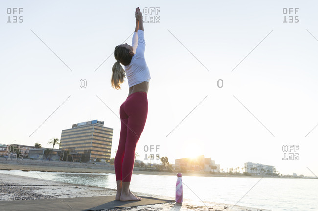 yoga sun salutation stock photos - OFFSET