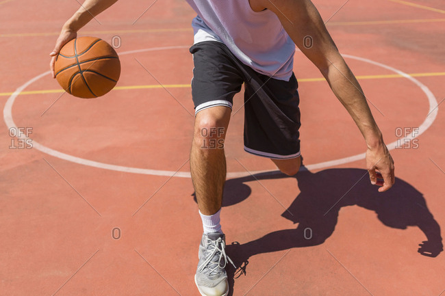 Young man playing basketball