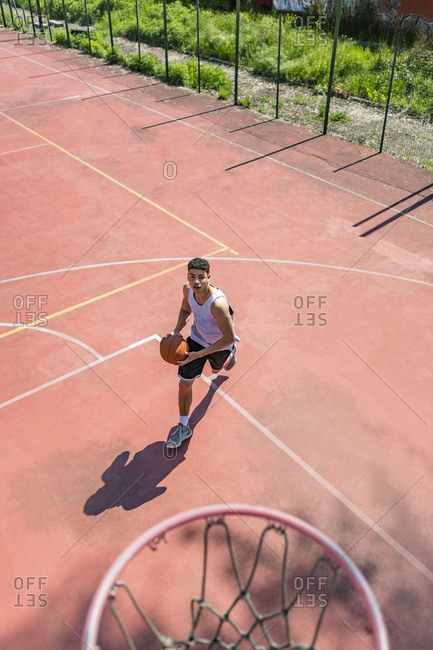 Young man playing basketball