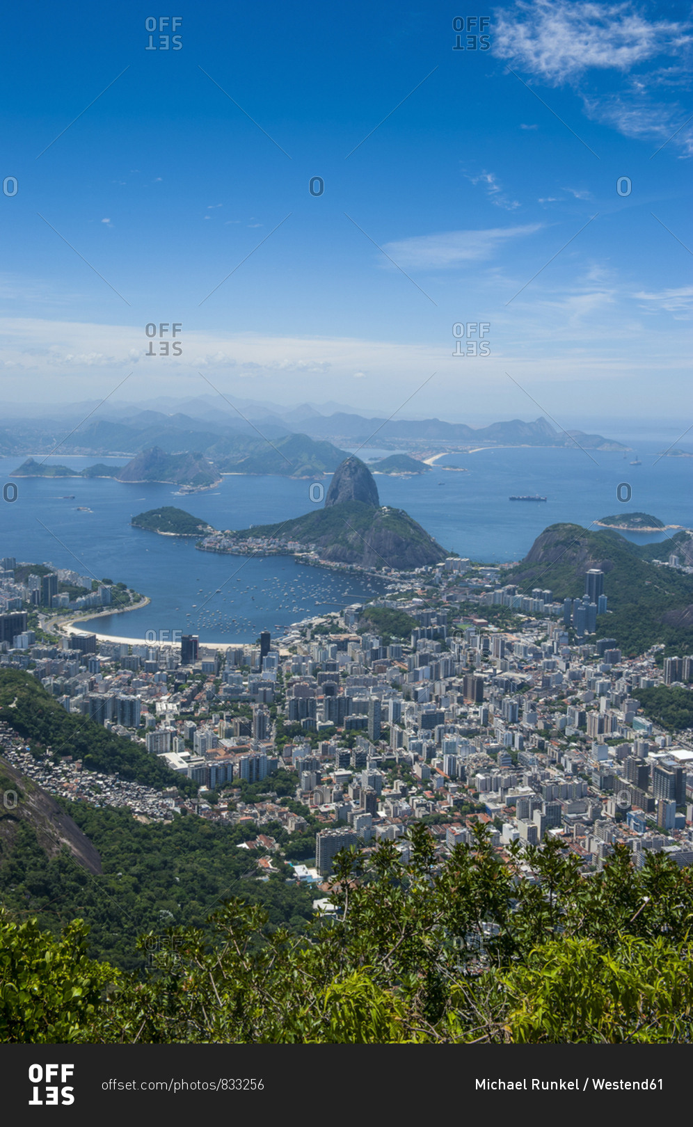 Outlook from the Christ the Redeemer statue over Rio de Janeiro with Sugarloaf Mountain- Brazil