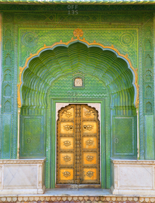 Ornate green entrance door to The City Palace complex, Jaipur, India