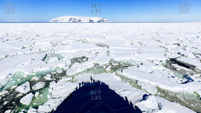 Shadow of ship on ice floe in East Antarctica