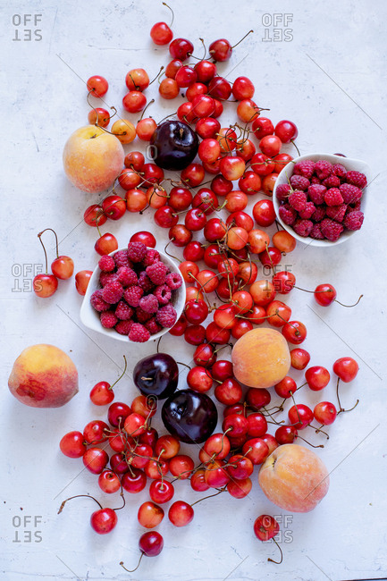Various fresh fruits and berries: cherries, raspberry, peaches
