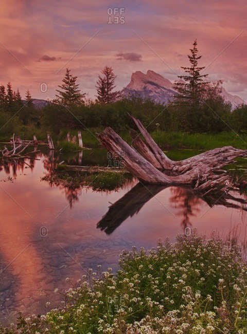 Twilight reflection of mountains in lake