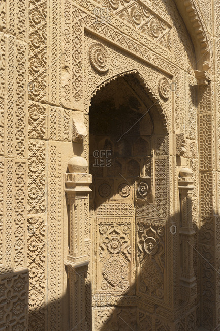 Thatta, Pakistan - April 21, 2018: Elaborately carved portal in the Makli Necropolis of Thatta, Pakistan