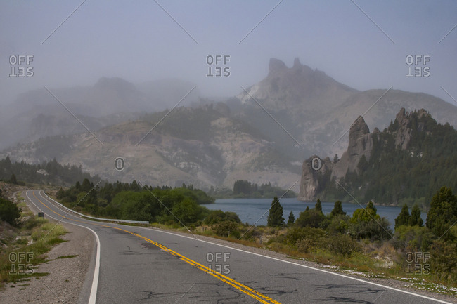 Fog above craggy hills- Road of the Seven Lakes- Argentina- South America