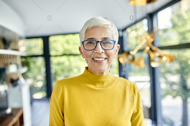 Portrait of a smiling senior woman at home