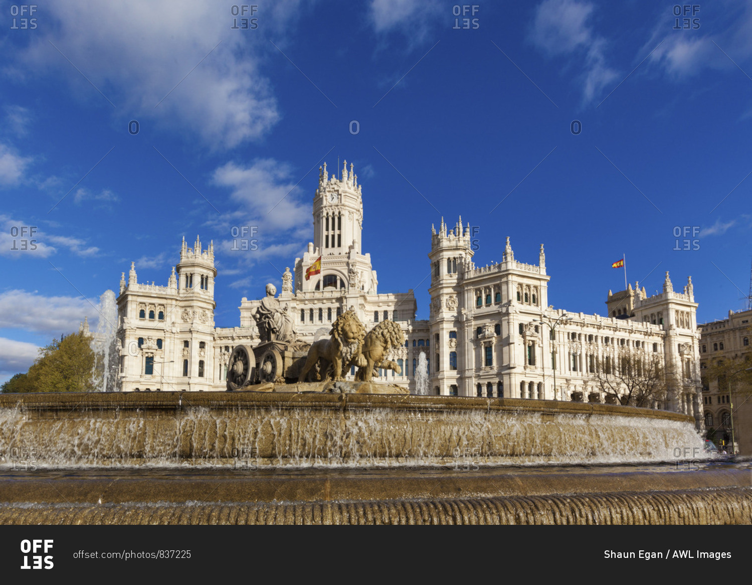 Spain, Madrid. Plaza de Cibeles with fountain and town hall building behind