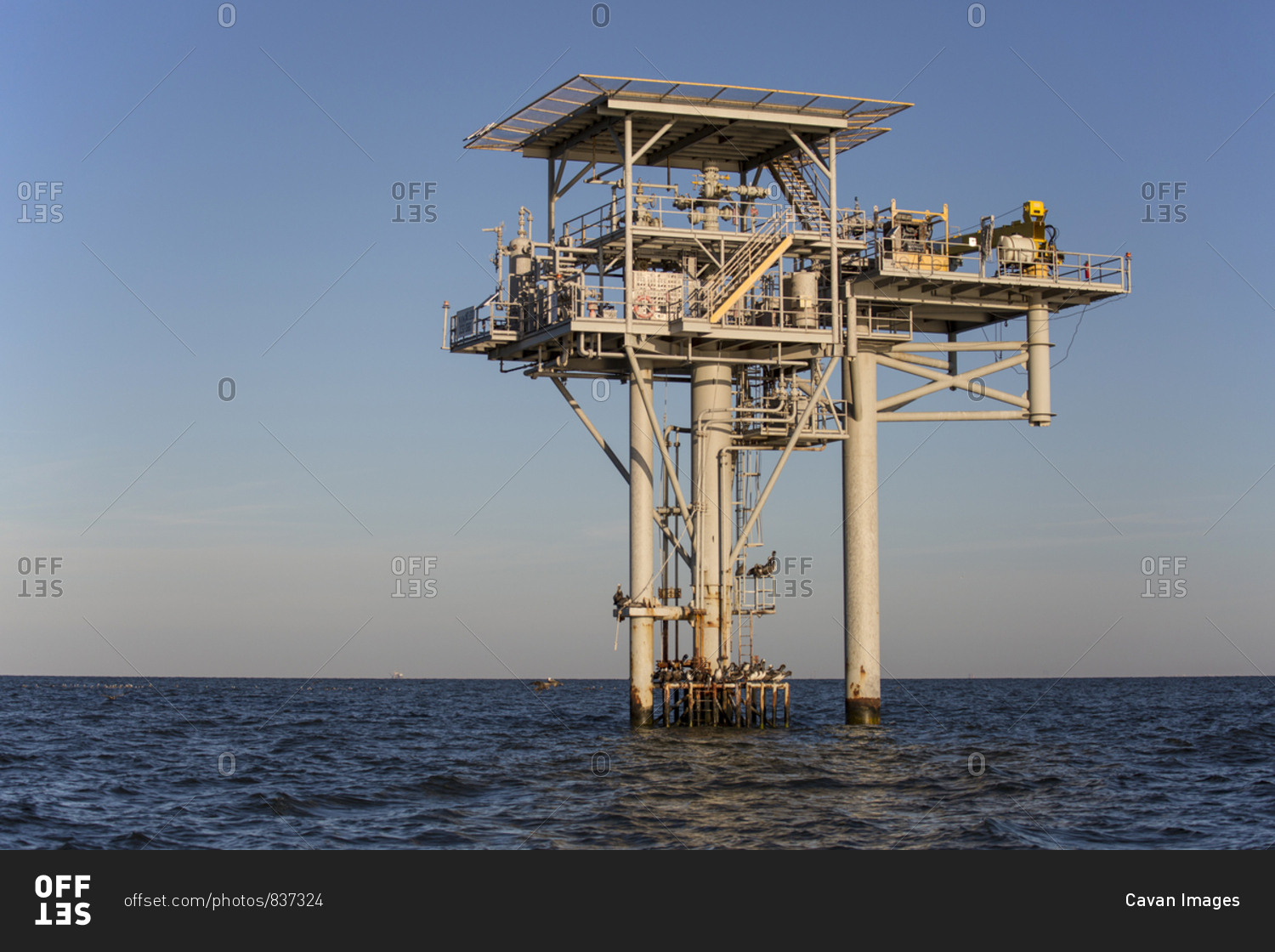 Oil platform against clear sky at dawn, Lake Charles, Louisiana, USA