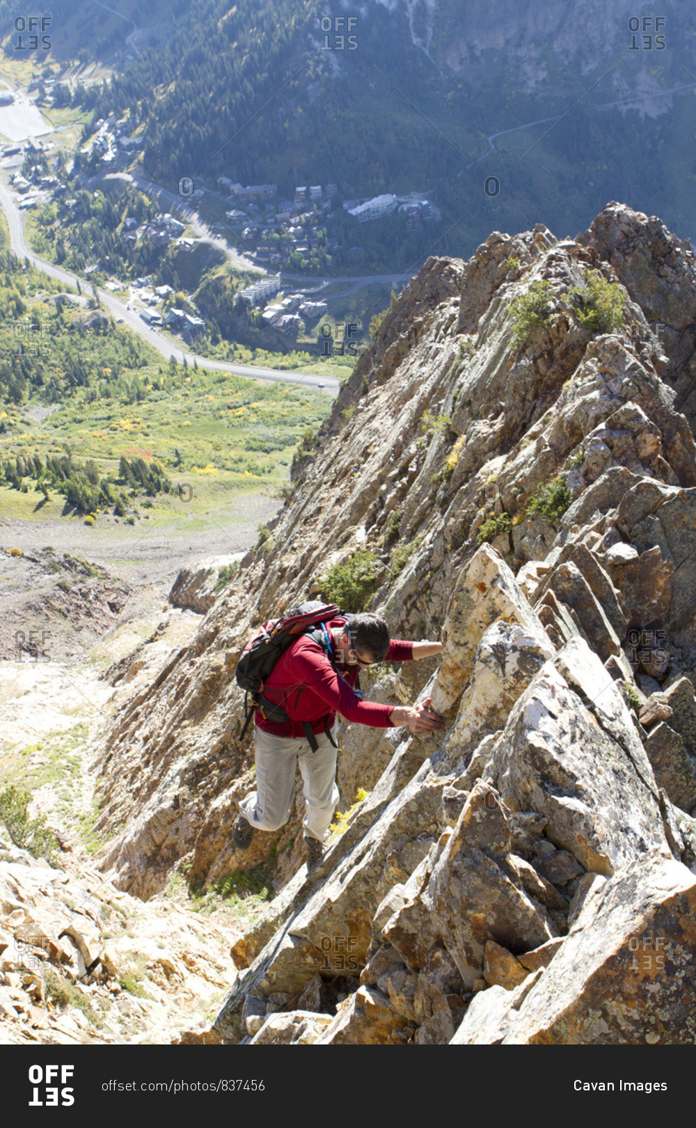A man enjoying a fall hike on the South Ridge of Mt Superior, Utah