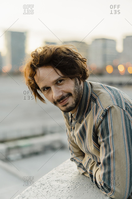 Portrait of relaxed man relaxing during sunset- Barcelona- Spain