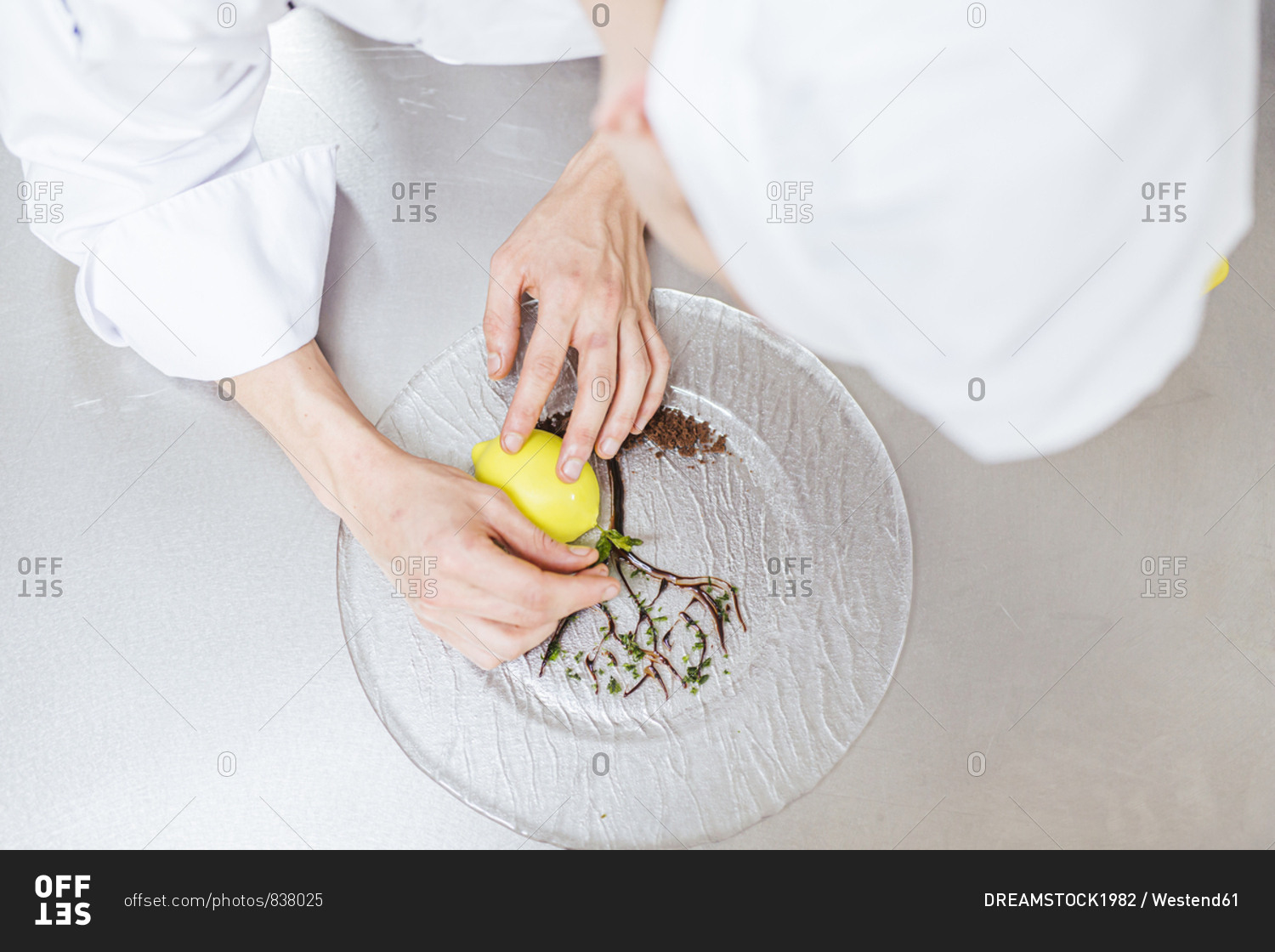 Junior chef preparing a dessert plate