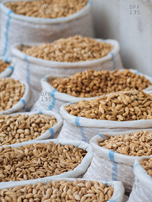 Abundance of almonds in bags for sale in market in Uzbekistan