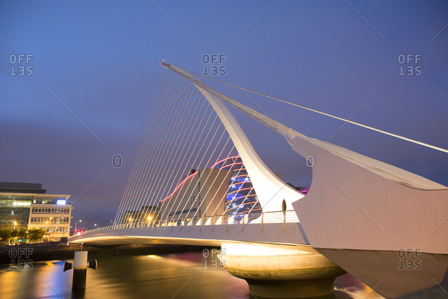 Dublin, Ireland - May 25, 2019: Samuel Beckett bridge river Liffey at dusk