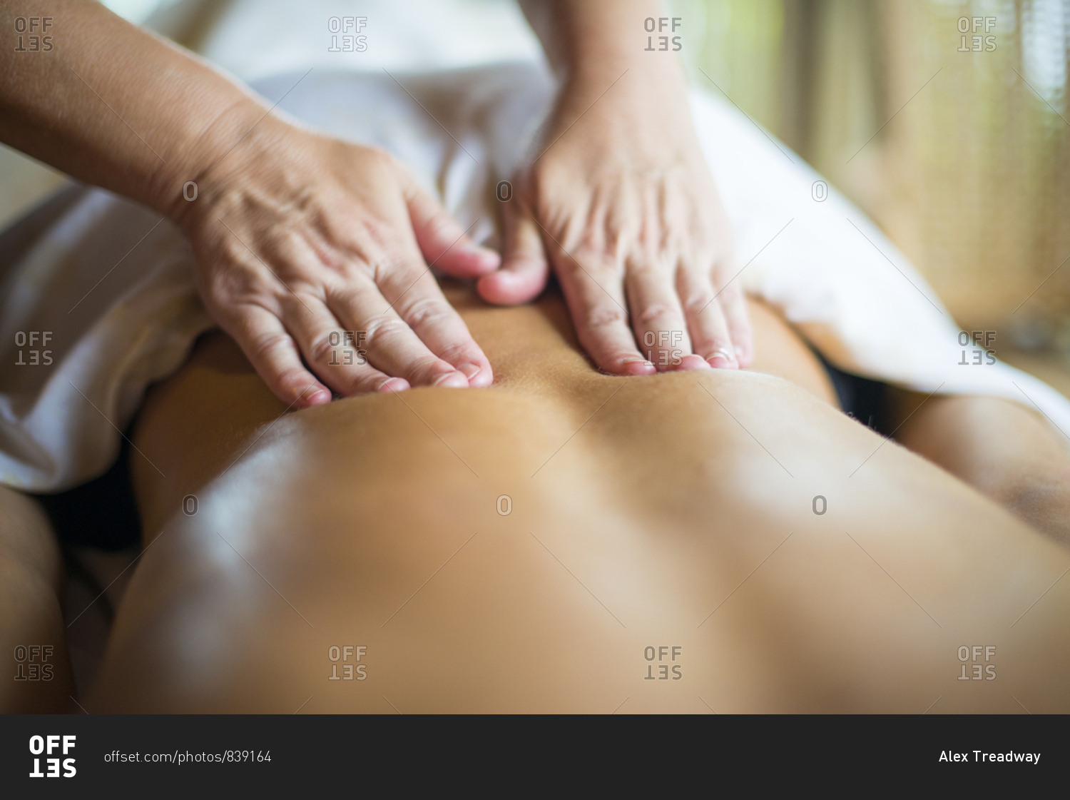 A woman being massaged