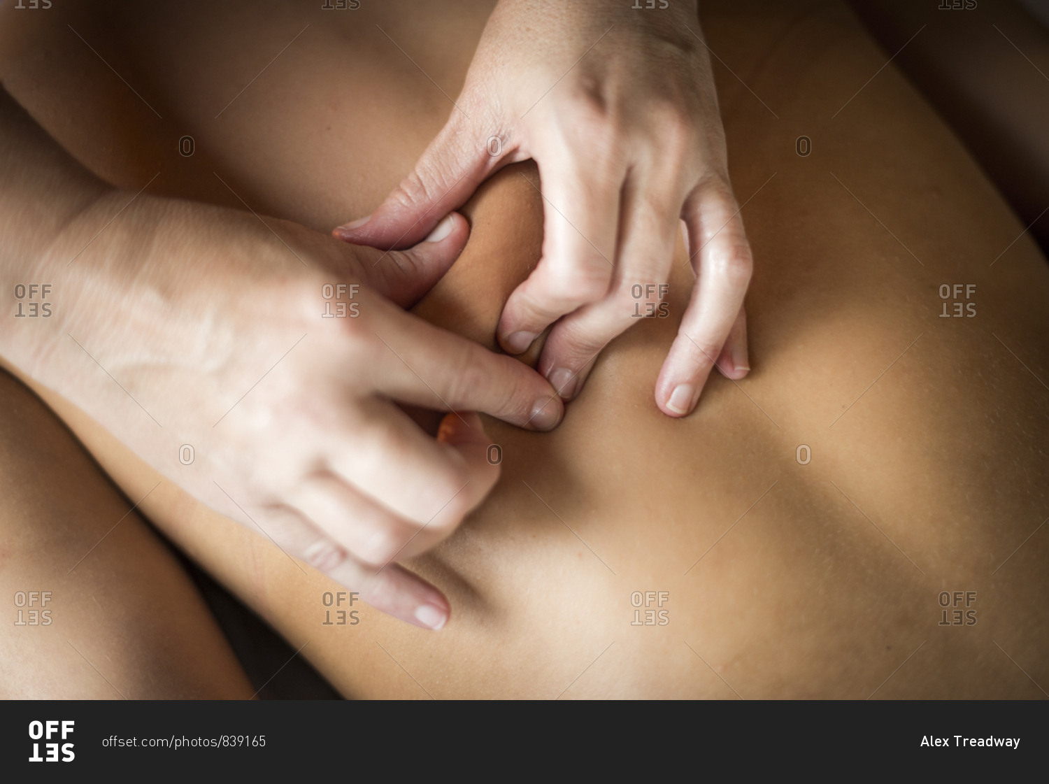 Overhead view of a woman being massaged