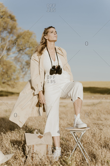 Female traveller with binoculars