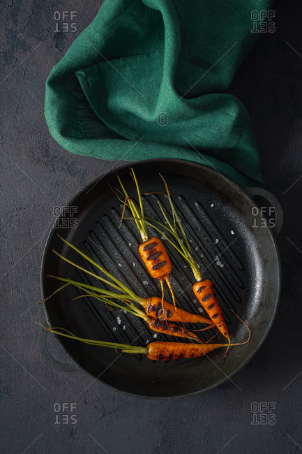 Carrots cooked in a pan grill top view