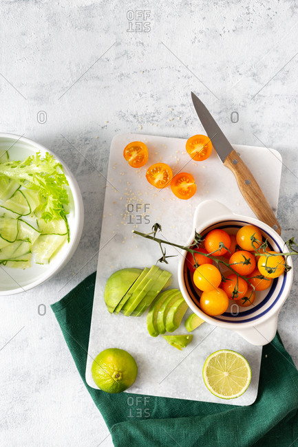 Ingredients for preparation dietary salad on a white background top view