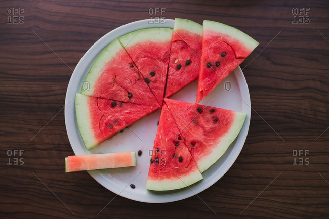 Overhead view of slices of watermelon on a plate
